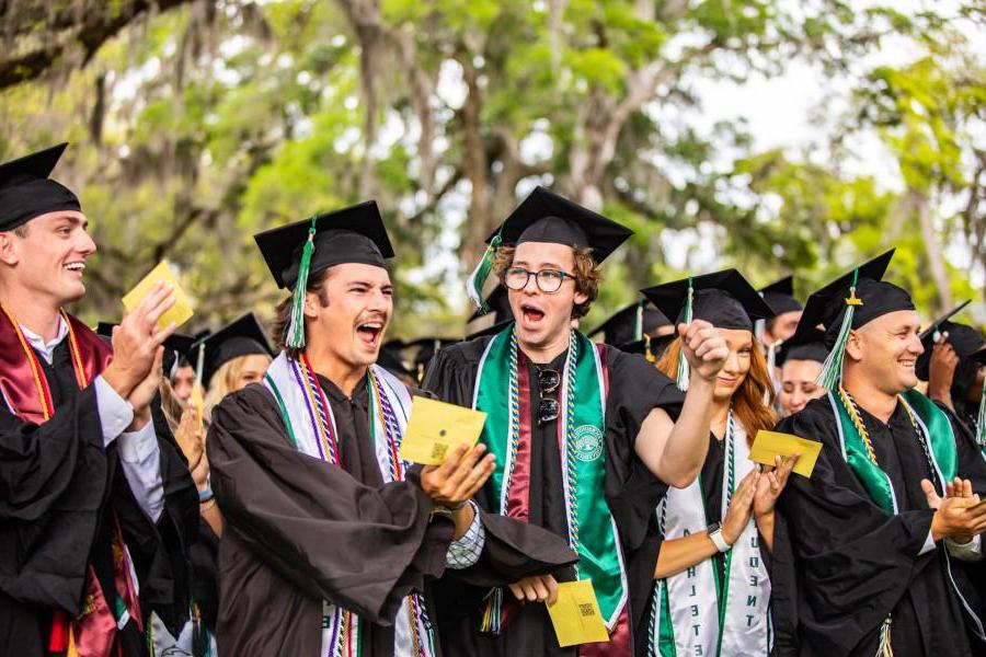 Students in graduation regalia at Jacksonville University